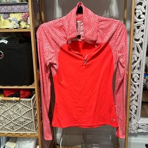 Orange long sleeve under Armour workout top